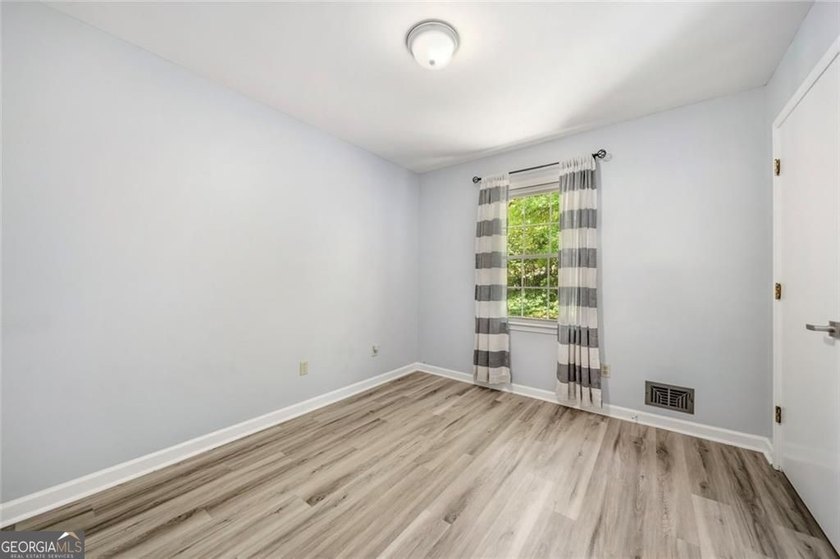 A beautifully maintained home with serene views of Canary Lake - photo 15