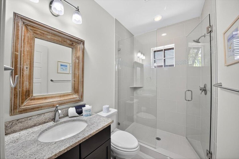 Step into coastal elegance in the popular Villa Lago community - photo 21