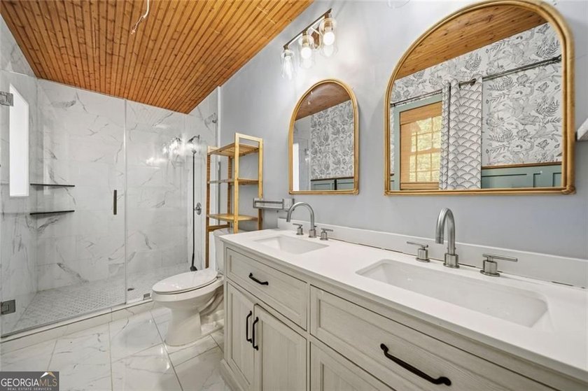 A beautifully maintained home with serene views of Canary Lake - photo 23