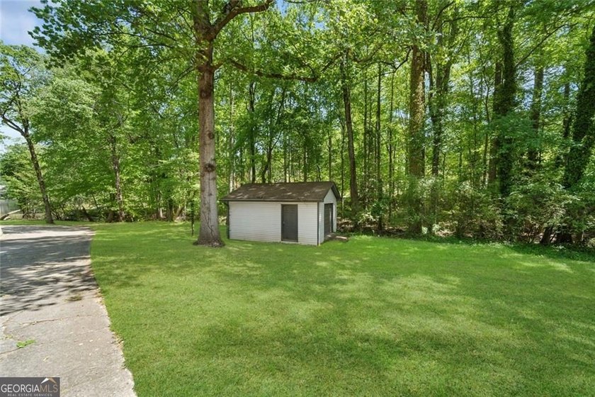 A beautifully maintained home with serene views of Canary Lake - photo 39