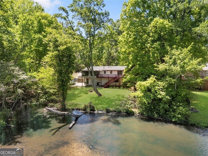 A beautifully maintained home with serene views of Canary Lake - photo 44