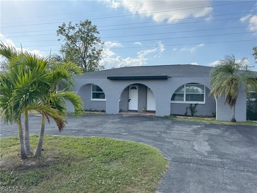 This well-maintained and thoughtfully updated duplex can be - photo 3