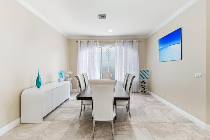 Welcome to this exceptional waterfront single-story residence - photo 13
