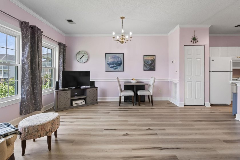 This stunning second-floor 1-bedroom, 1.5-bath condo offers - photo 5