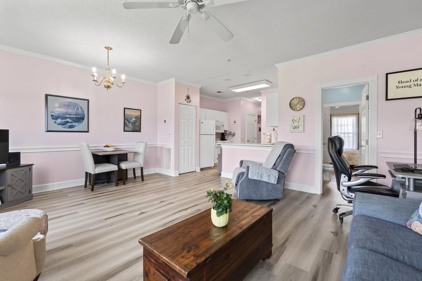 This stunning second-floor 1-bedroom, 1.5-bath condo offers - photo 6