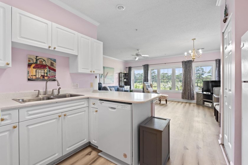 This stunning second-floor 1-bedroom, 1.5-bath condo offers - photo 7