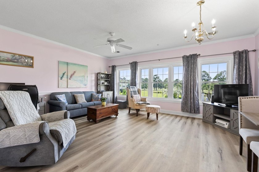 This stunning second-floor 1-bedroom, 1.5-bath condo offers - photo 9