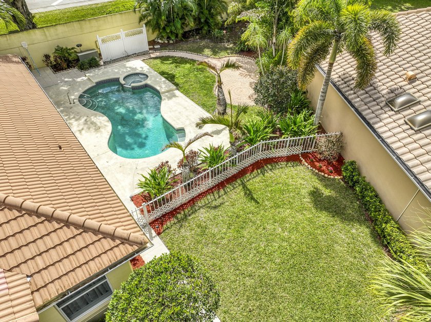 A well-maintained backyard oasis on one of the larger lots in - photo 36