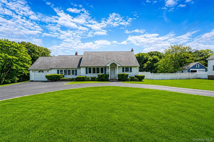 Welcome to 376 South Country Road, where space, comfort, and - photo 2