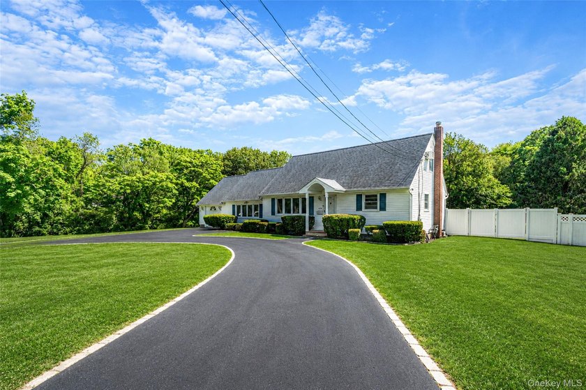 Welcome to 376 South Country Road, where space, comfort, and - photo 3