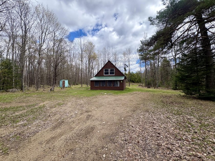 Tucked away at the end of a dead-end road, this off-grid camp - photo 3