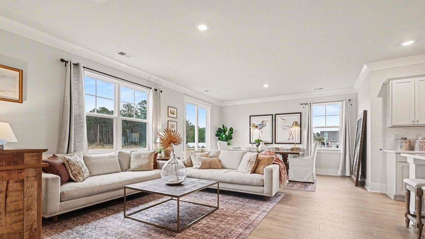 *4 bedrooms, 2.5 baths *Welcoming front porch and screened in - photo 6