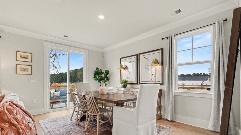 *4 bedrooms, 2.5 baths *Welcoming front porch and screened in - photo 7