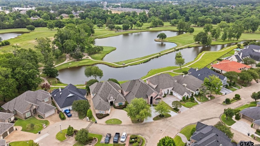 This extraordinary estate is located in the gated community of - photo 4