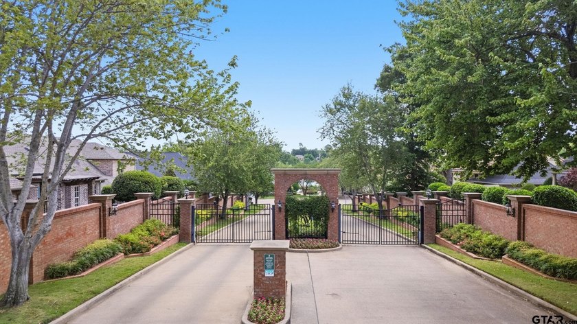 This extraordinary estate is located in the gated community of - photo 6
