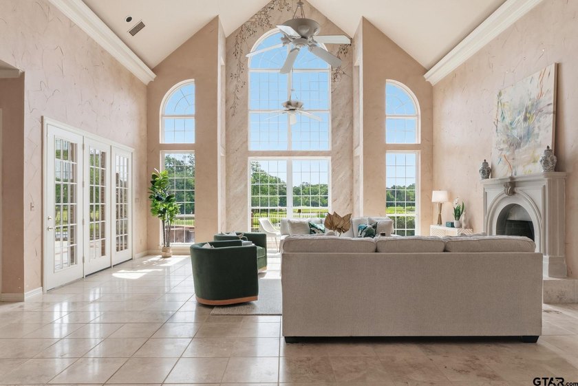 This extraordinary estate is located in the gated community of - photo 9