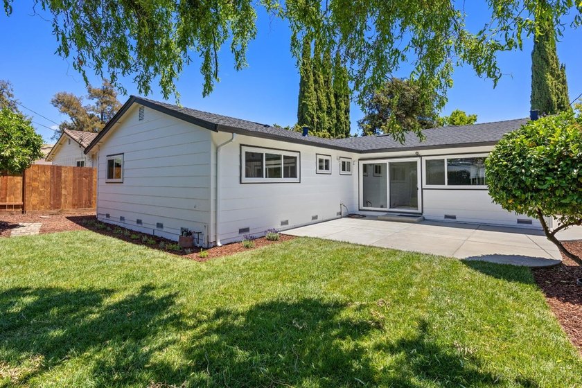 What a beautiful home! This home includes a new roof, flooring - photo 16