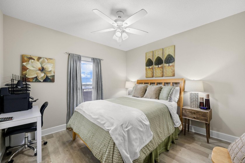 Wake up to sweeping Gulf views from this beautifully updated - photo 10