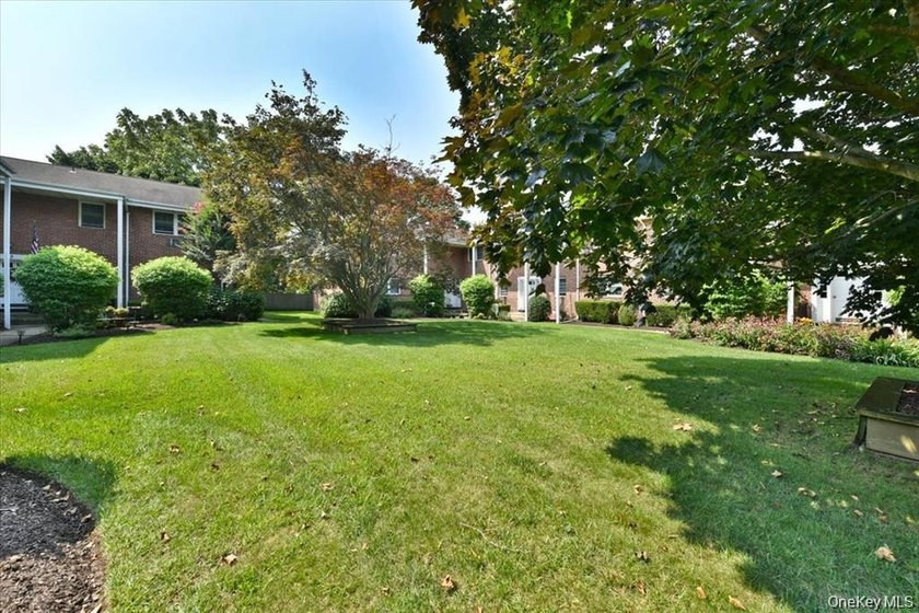 Welcome To 295 Merrick Road, Unit 4A ! This Maintenance Free - photo 3