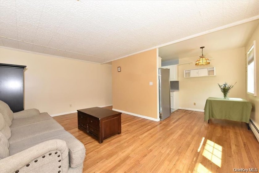 Welcome To 295 Merrick Road, Unit 4A ! This Maintenance Free - photo 6