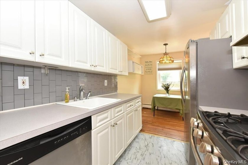 Welcome To 295 Merrick Road, Unit 4A ! This Maintenance Free - photo 8