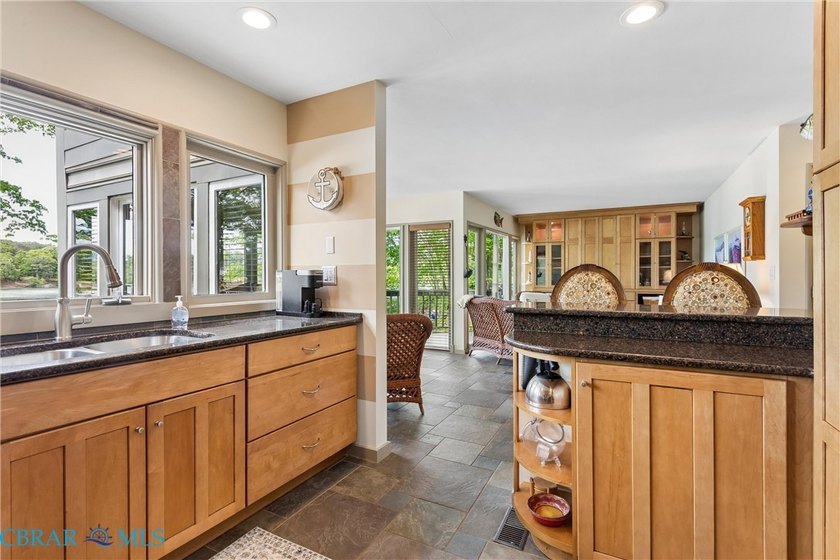 Step into this beautifully updated condo just in time for summer - photo 11