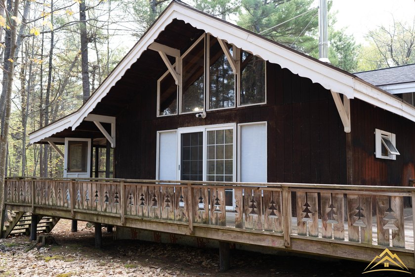 Tucked among the pines of Au Sable Acres, this fully furnished - photo 3