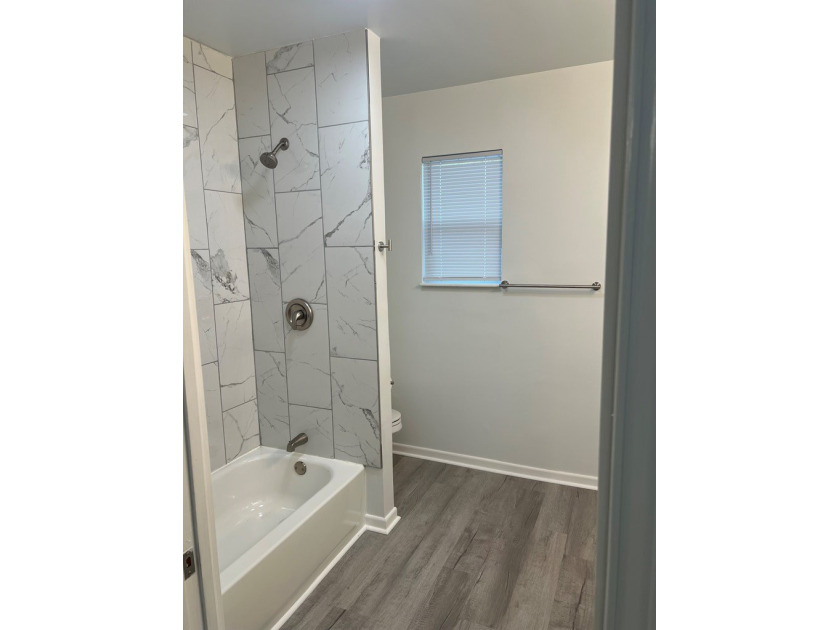 This beautifully updated 3-bedroom, 2-bath home features a - photo 14