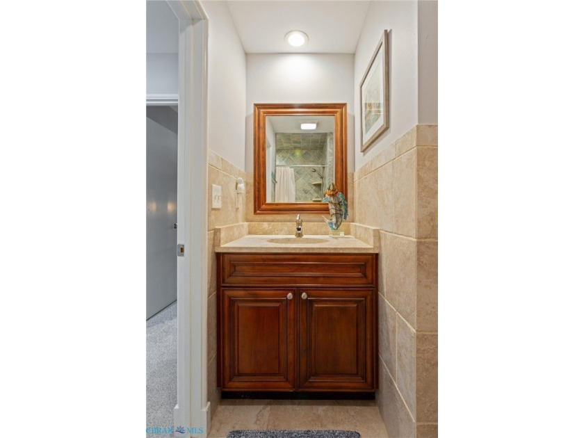 Step into this beautifully updated condo just in time for summer - photo 16