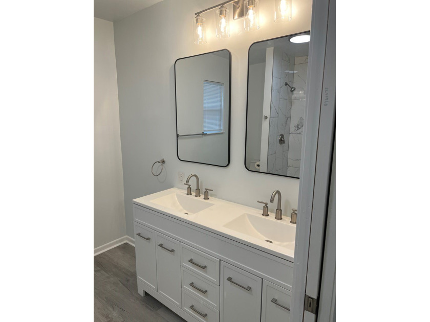 This beautifully updated 3-bedroom, 2-bath home features a - photo 16