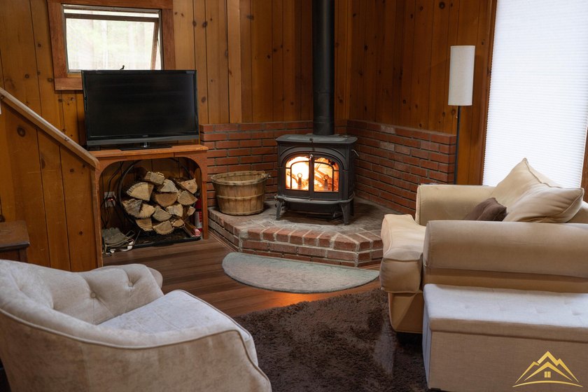 Tucked among the pines of Au Sable Acres, this fully furnished - photo 7