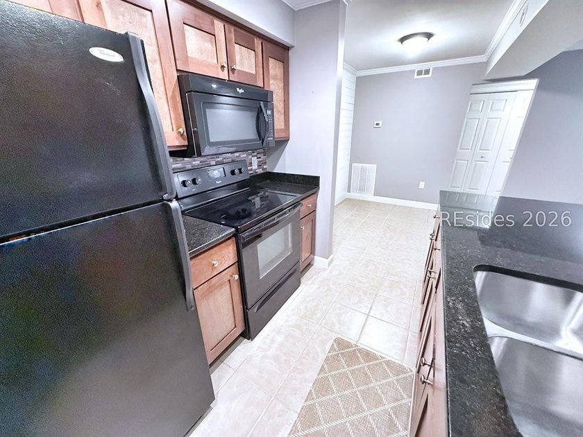 This first-floor beautifully remodeled 2 bedroom, 2 full bath - photo 30