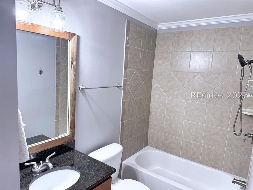 This first-floor beautifully remodeled 2 bedroom, 2 full bath - photo 34