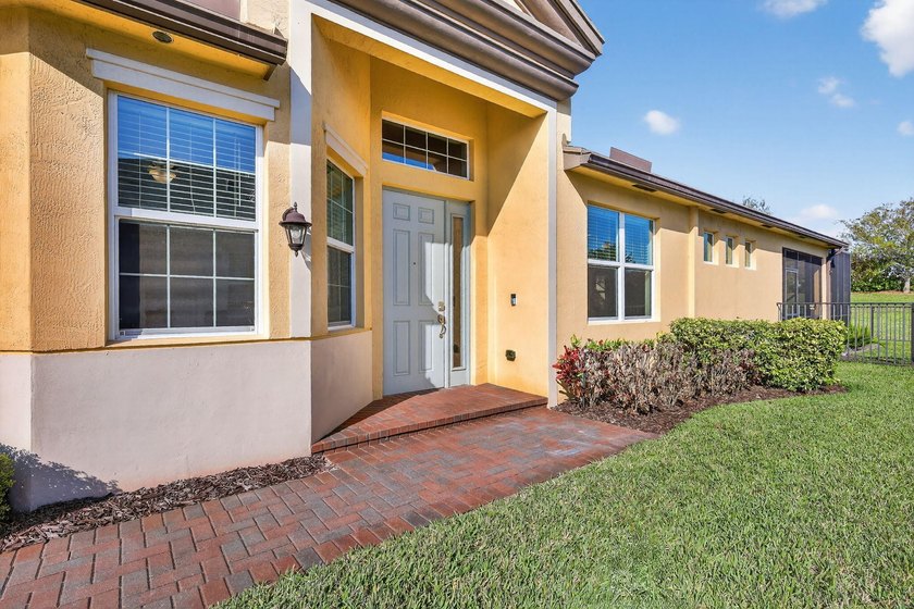 Experience low-maintenance living in LakePark at Tradition, an - photo 3