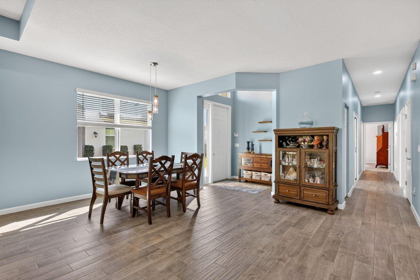 Experience low-maintenance living in LakePark at Tradition, an - photo 5
