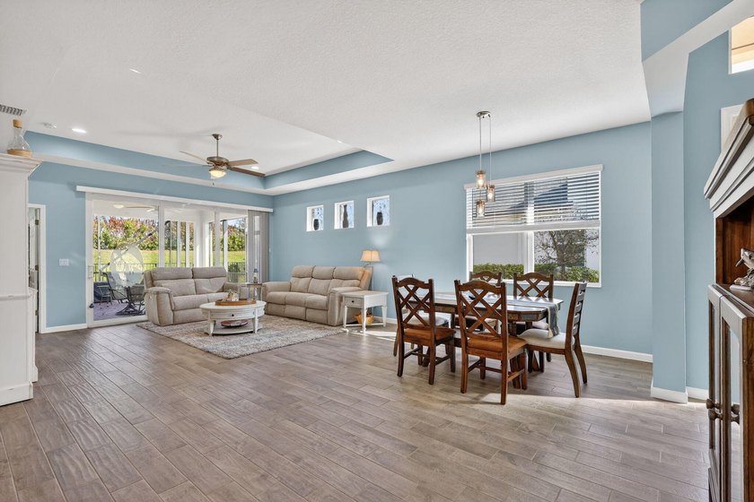 Experience low-maintenance living in LakePark at Tradition, an - photo 7