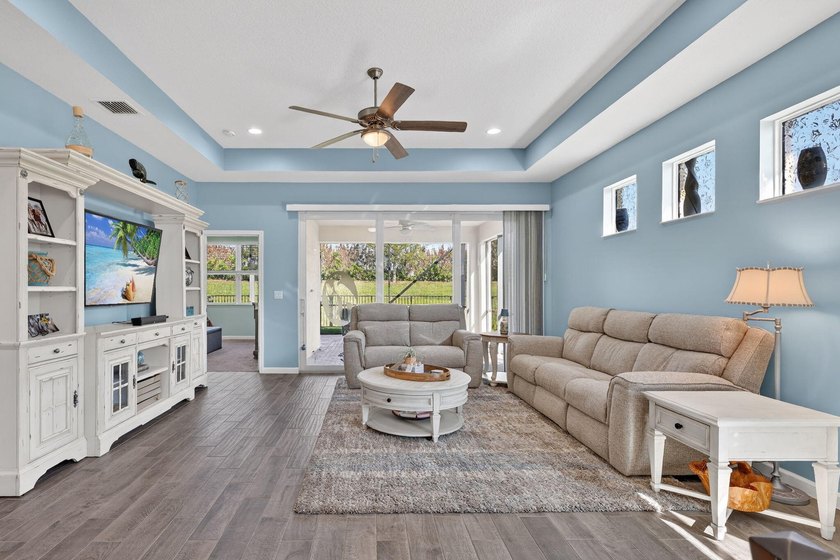 Experience low-maintenance living in LakePark at Tradition, an - photo 8
