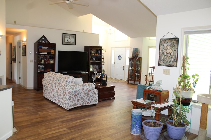 This open concept ranch style home on a slab is in a desirable - photo 8