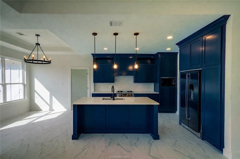 New construction on over half an acre in Hilltop Lakes. Situated - photo 3