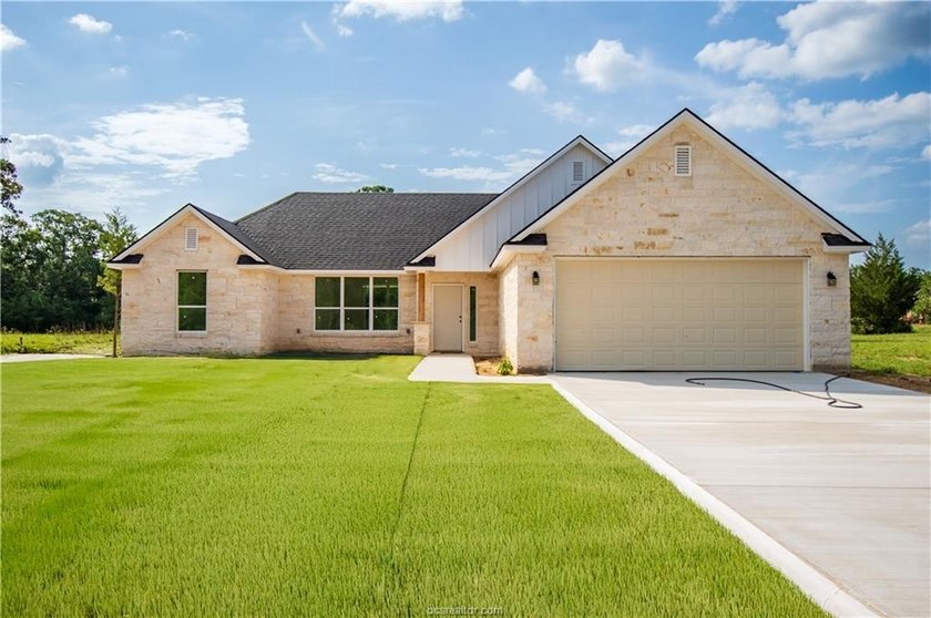 New construction on over half an acre in Hilltop Lakes. Situated - photo 5