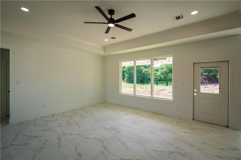 New construction on over half an acre in Hilltop Lakes. Situated - photo 6