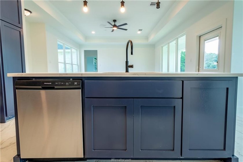 New construction on over half an acre in Hilltop Lakes. Situated - photo 7