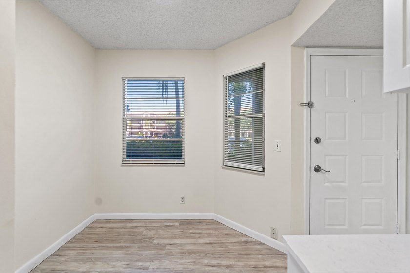 Beautifully renovated 2 BD, 2 BA first-floor condo in Century - photo 10