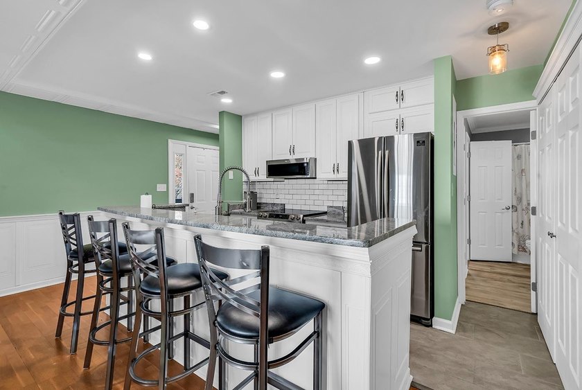 Welcome to this completely updated 2 bedroom 2 bath condo in the - photo 10