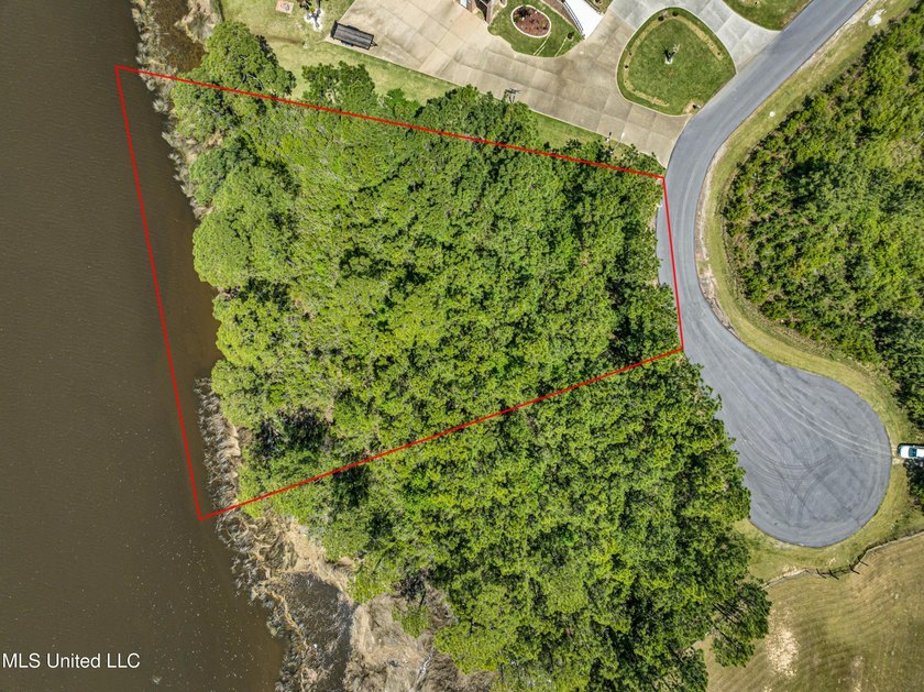 Build your waterfront dream on this .86-acre unimproved lot on - photo 12