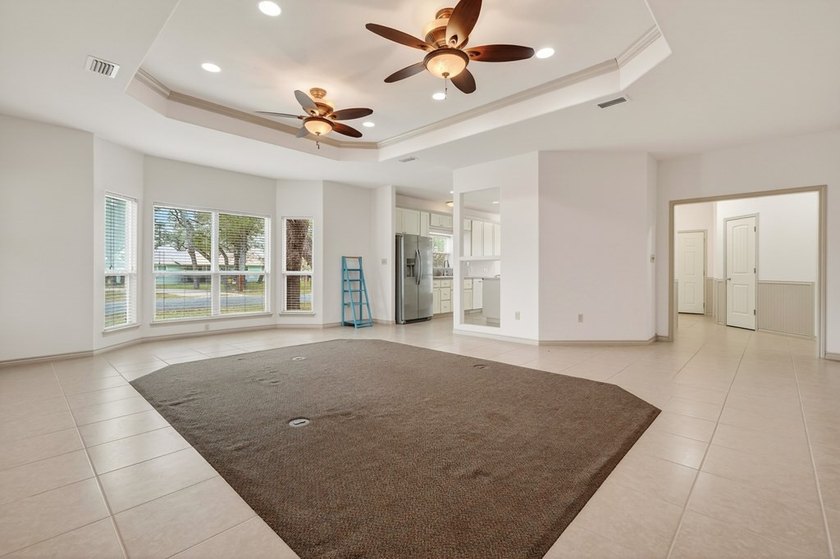 Nestled on a nicely landscaped spacious .66-acre corner lot in - photo 11