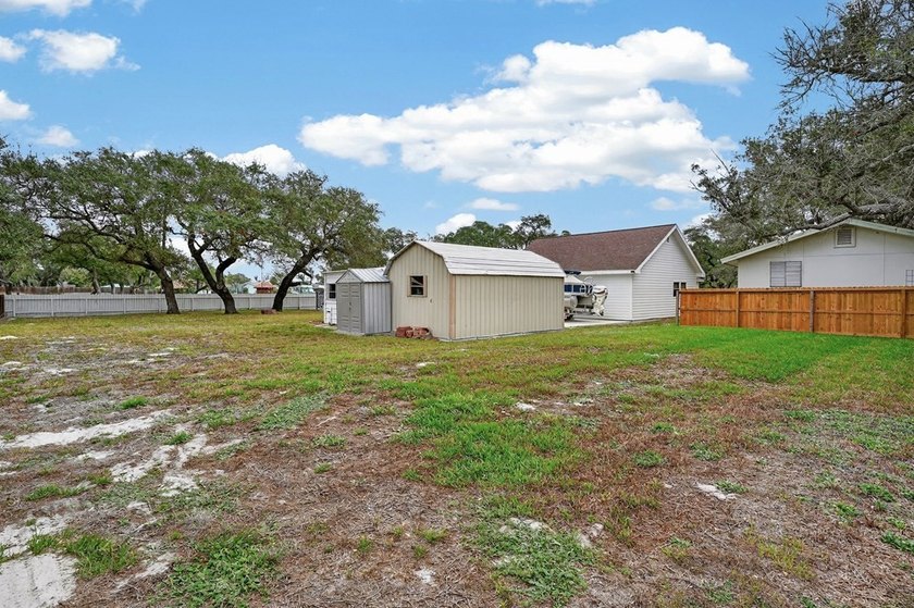 Nestled on a nicely landscaped spacious .66-acre corner lot in - photo 46