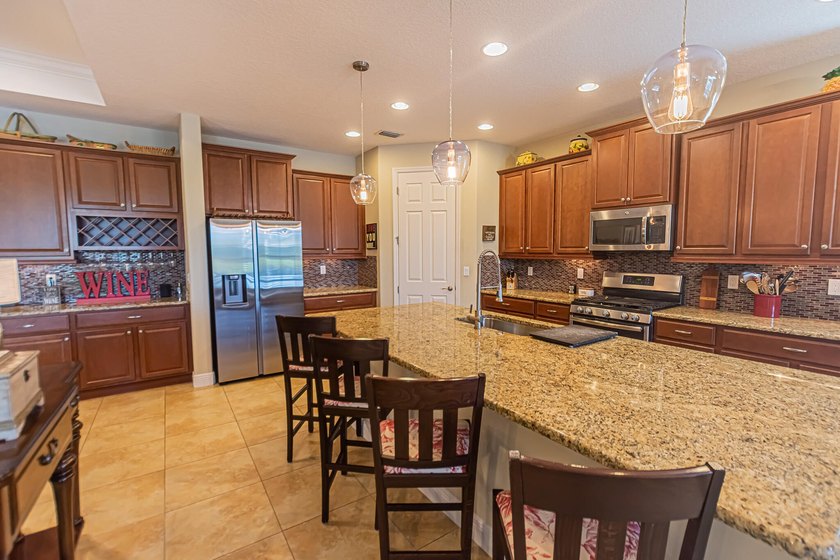 Enjoy refined waterfront living in Vitalia in this beautifully - photo 6