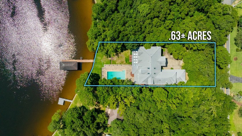 Experience exceptional waterfront living with over 100 feet of - photo 5