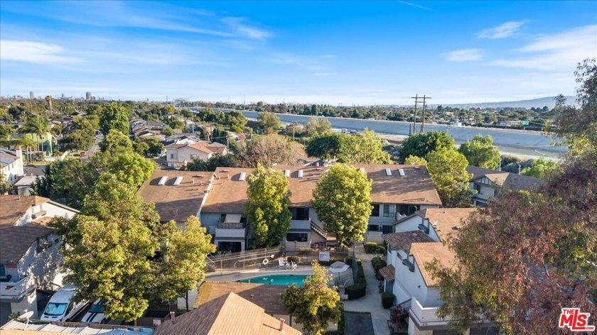 Welcome to this spacious two-story townhome-style condo in the - photo 14